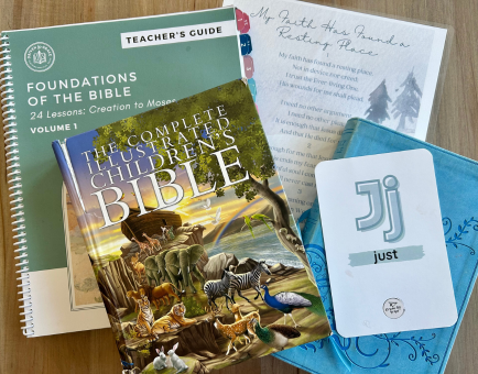 illustrated children's bible, Bible study, hymn and letter card on table