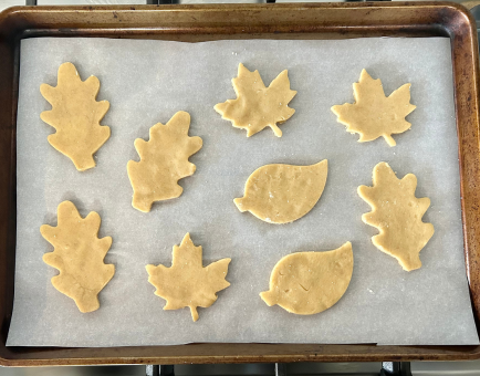 leaf shaped cheese crackers on baking sheet before baking