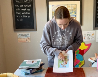 mom showing Japan map to children
