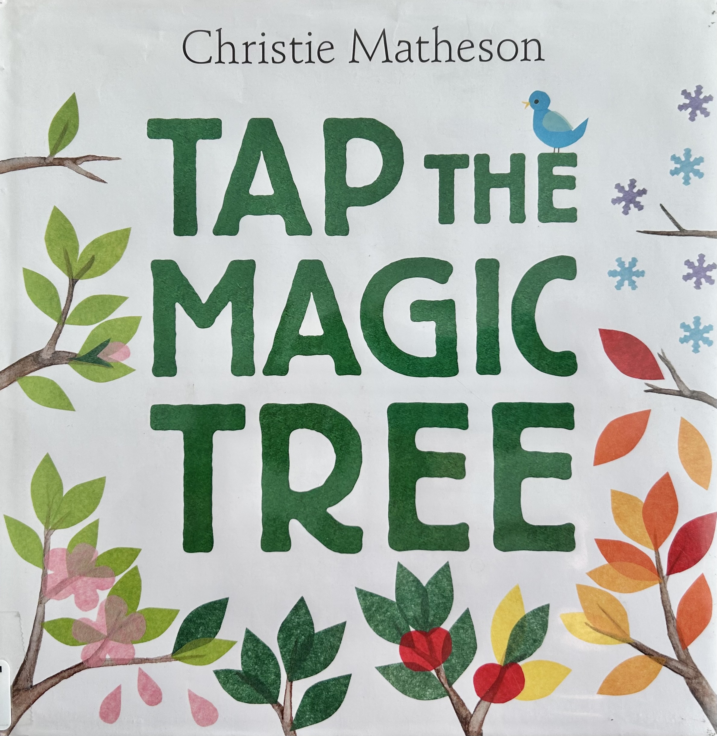 The book, Tap the Magic Tree by Christie Matheson.