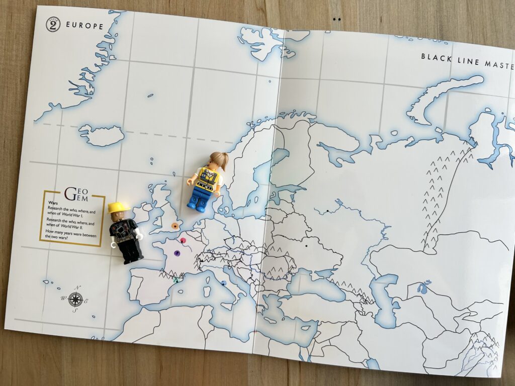 map with European cities highlighted and lego men