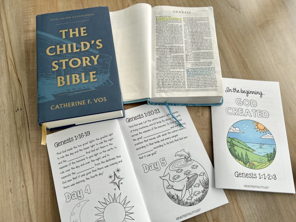 genesis mini book and bibles on table